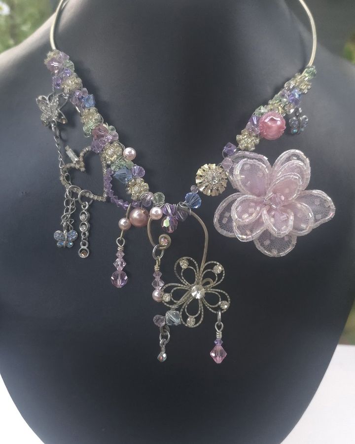 Inner Child's Delight  with a beaded pink flower, rhinestone heart and filigree flower
